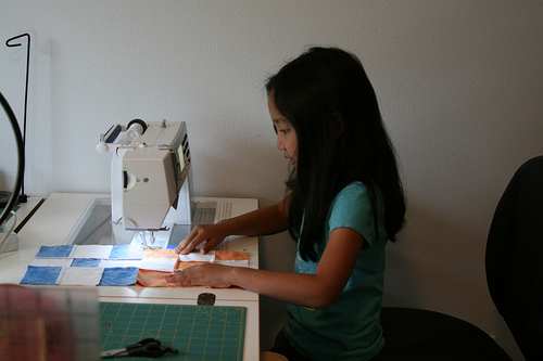 Madeline making 9-patches